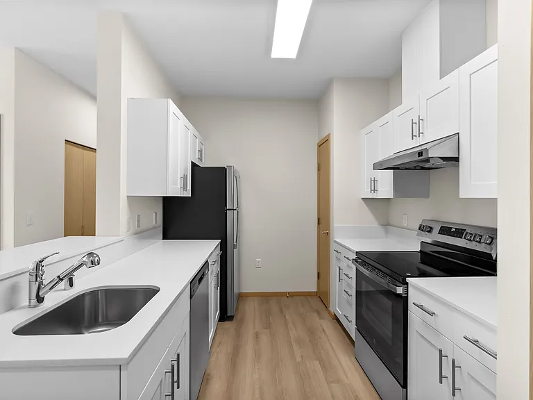 A sleek and functional kitchen design with plenty of storage and modern finishes. A sleek and functional kitchen design with plenty of storage and modern finishes.
