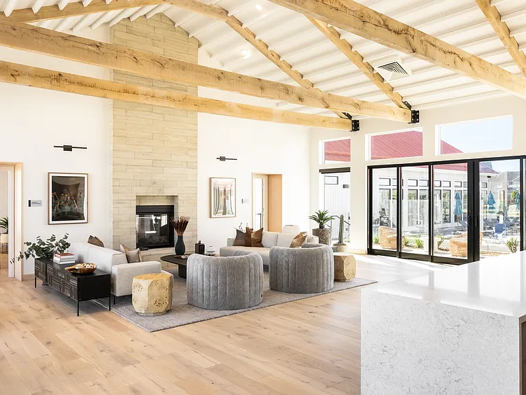 Clubhouse with grand fireplace & lounge seating