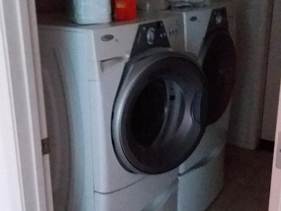 Laundry Room with extra space beside dryer, Shelves, hanging rack
