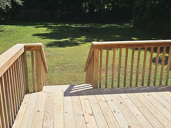 Deck and huge fenced in back yard