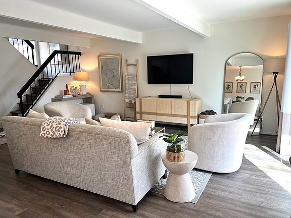 Living room and staircase to upstairs.
