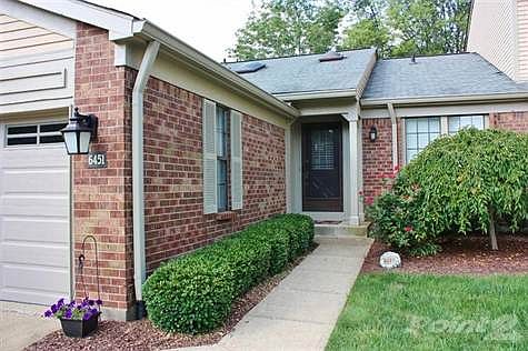 The entryway is welcoming to this well cared for home.