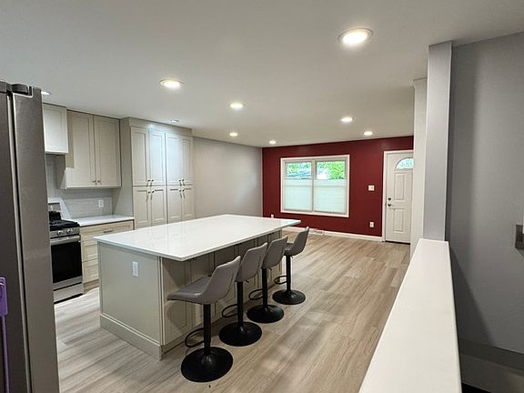 Eat in Kitchen & Living Room with vinyl flooring