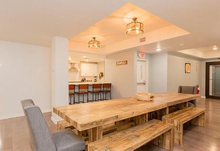 Have friends over for dinner and use the common area kitchen and dining room.