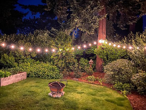 BACKYARD // Nighttime charm with fire pit.