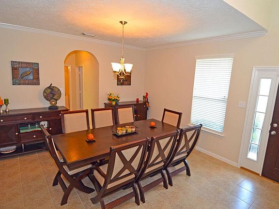 The dining room will fit most any size table.