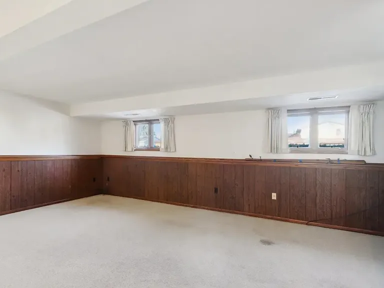 Lower level family room. Carpet has been replaced.