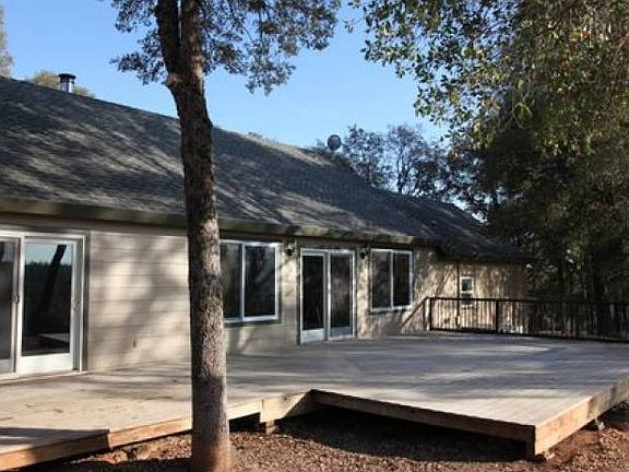 Rear View of Home and Pat