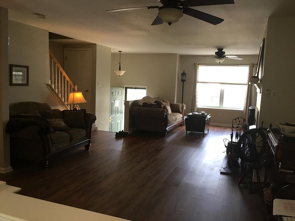 Updated living and family room near front entrance.