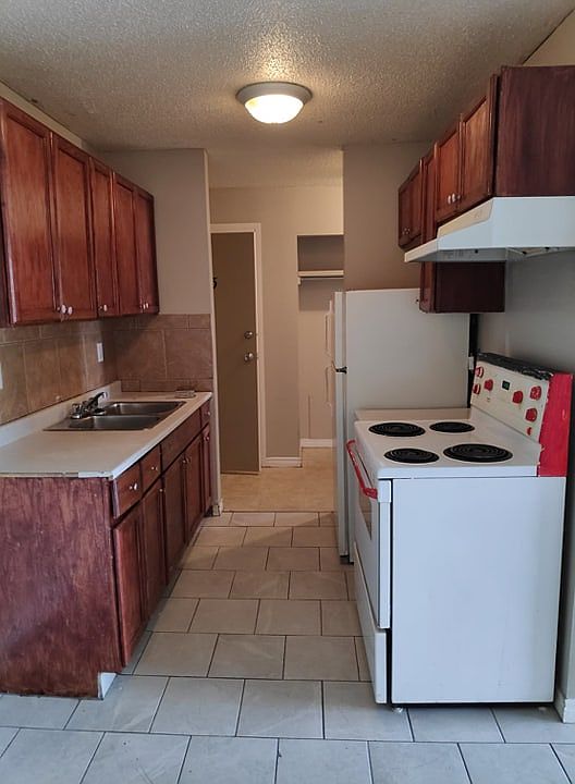 1st image of 8640 106th Ave NW #205