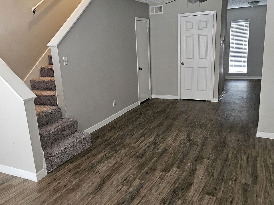 View from main front entry door. Half bath under stairs.