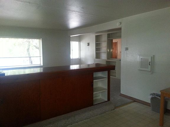 Breakfast Bar & Great Room From Kitchen.  