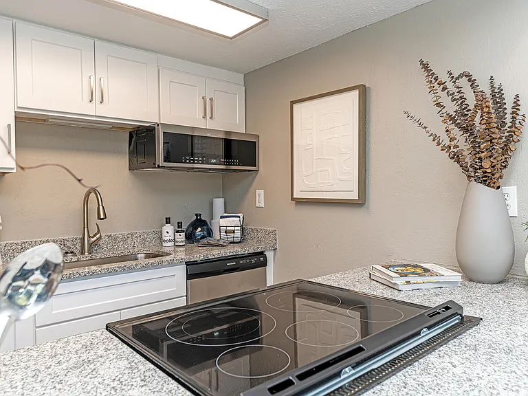 Kitchen with granite counters and stainless appliances