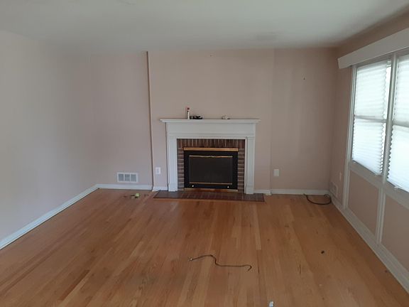 Living room with working fireplace.