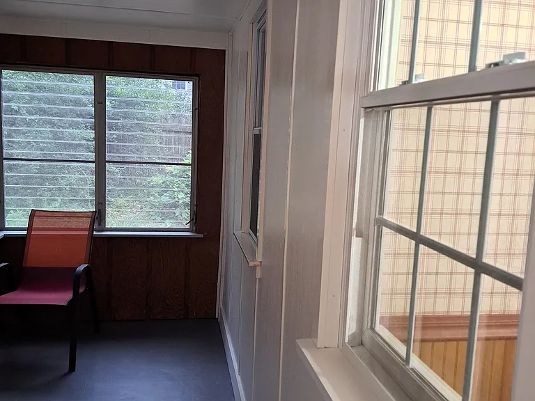 Enclosed back porch entrance from kitchen