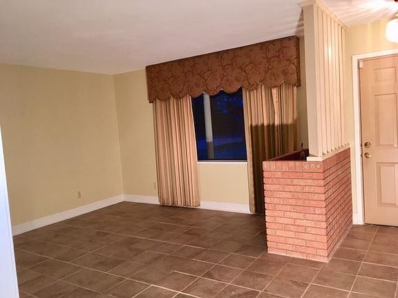 Front living room, Front door, Custom draperies open