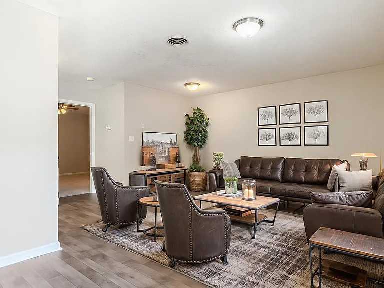 Welcome to Guest House, where modern elegance meets comfort. Enjoy our inviting lounge area, perfect for relaxation and social gatherings. Take the next step in finding your ideal home - schedule a tour today!