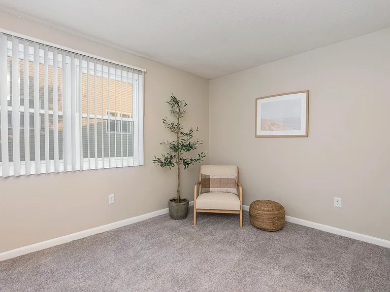 Relish in luminous bedrooms graced by large windows, infusing the space with natural light and a warm ambiance.