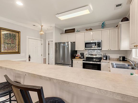 5th image of 4865 Magnolia Pointe #201