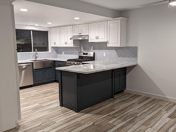 Another view of kitchen from dining area