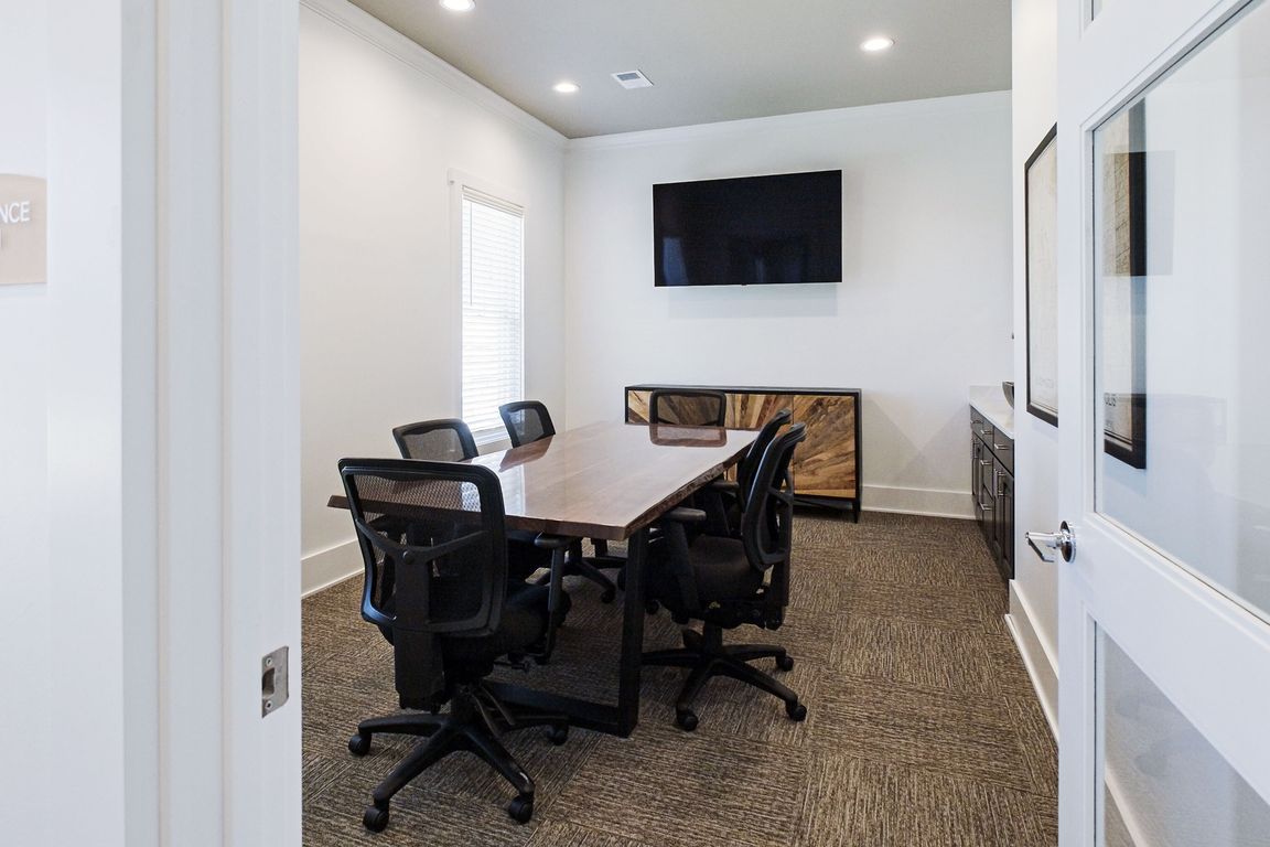 A warm and inviting space for focused teamwork and bright ideas.
