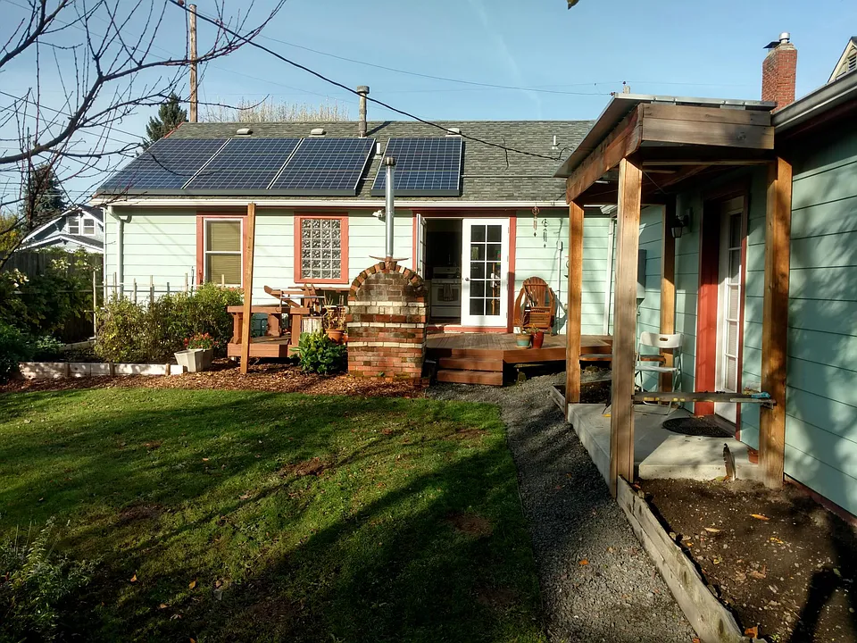 Backyard view of deck, solar and ADU