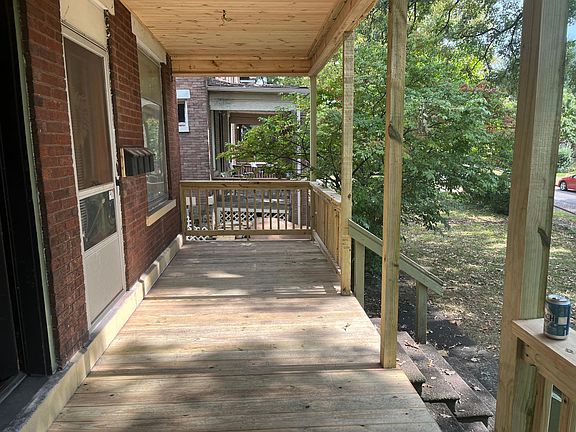 New porch - will be painted once wood dries out during Summer 2024
