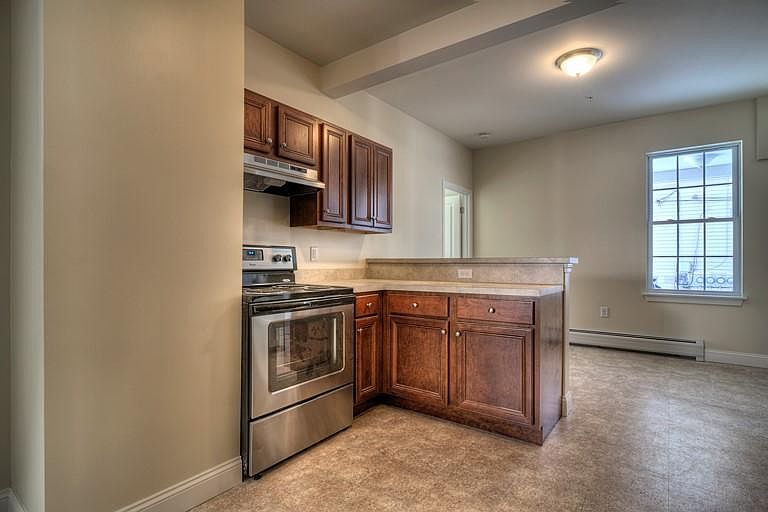 Stove and prep area/breakfast bar