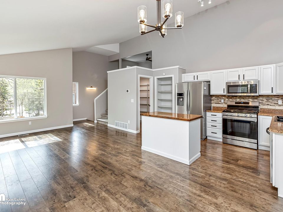 Kitchen & open concept living room.