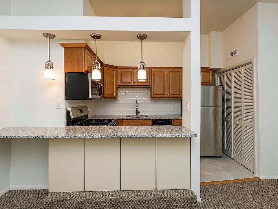 Living room looking into kitchen