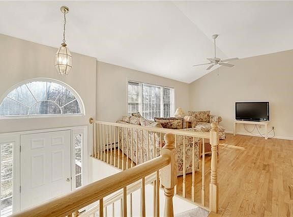 You are welcomed into this home through the sun filled entry foyer.  Custom window accents the spacious foyer.