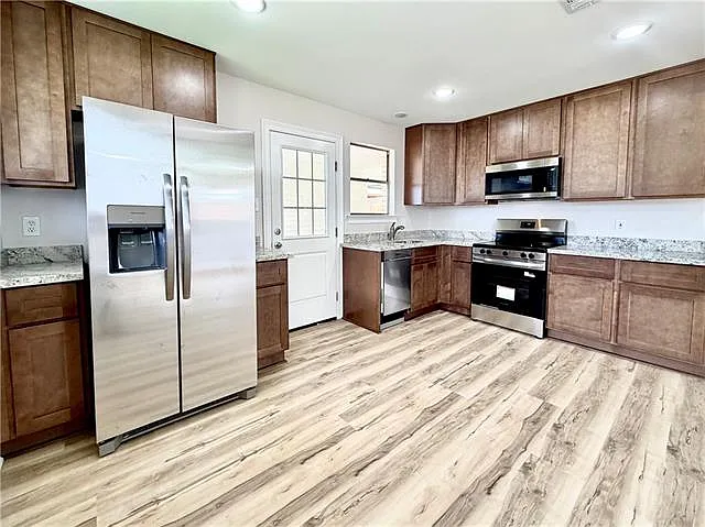 5016 Trenton St — Photo 3