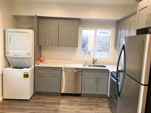 Unit #8 Kitchen & Laundry Area Unit #8 Kitchen & Laundry Area