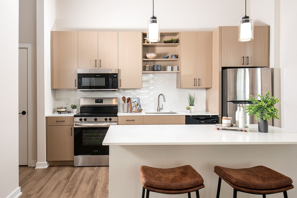 Experience the elegance and functionality of this beautifully designed kitchen, featuring top-of-the-line finishes.