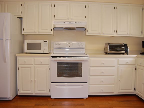 Kitchen has new hardwood floor.