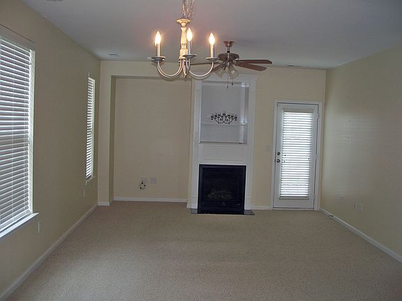 Great room with gas fireplace and shelving