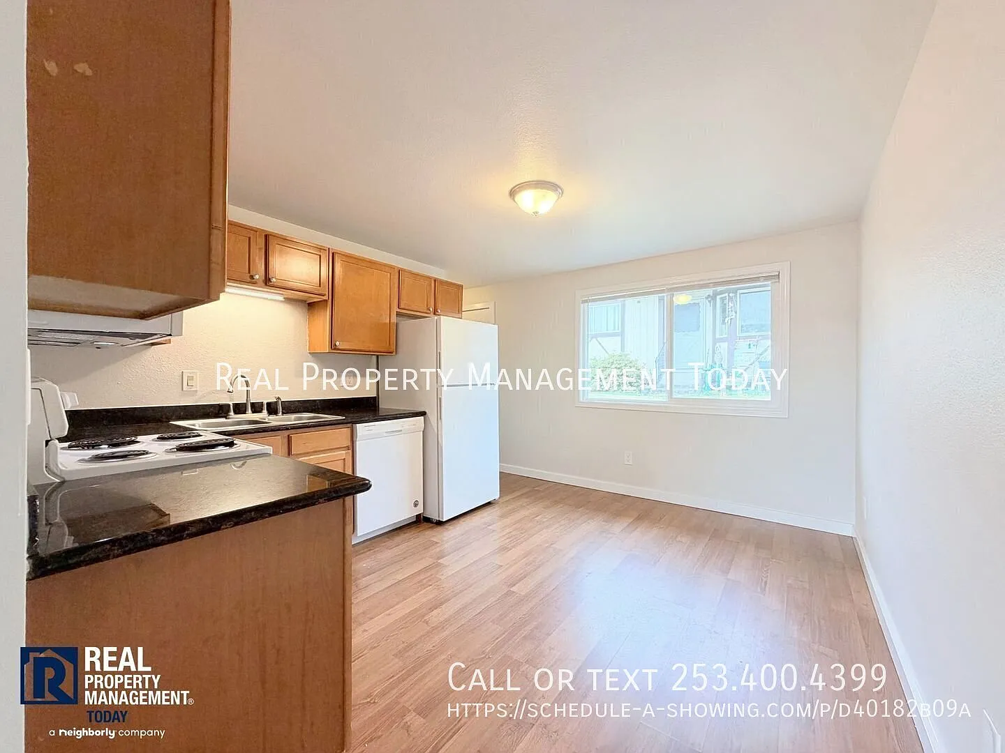 Ground-Floor 2-Bedroom Triplex Unit with Private Patio & Carport — Photo 4