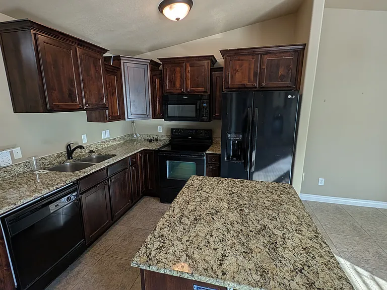 Kitchen with granite countertops