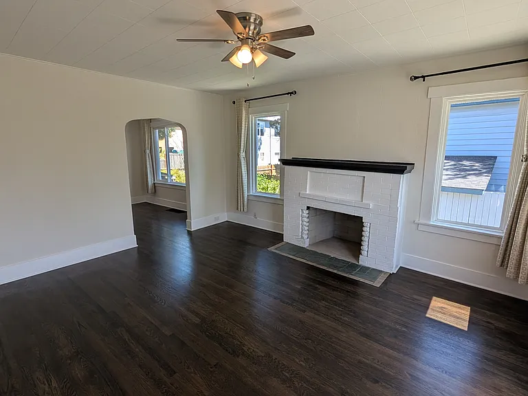Living room/Den with new wood burning fireplace