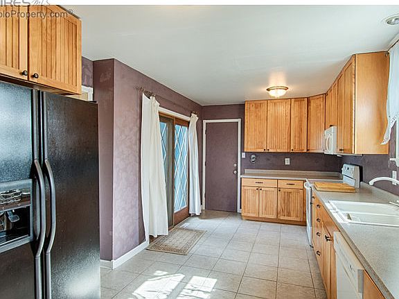 Tile floor, French Doors to Patio