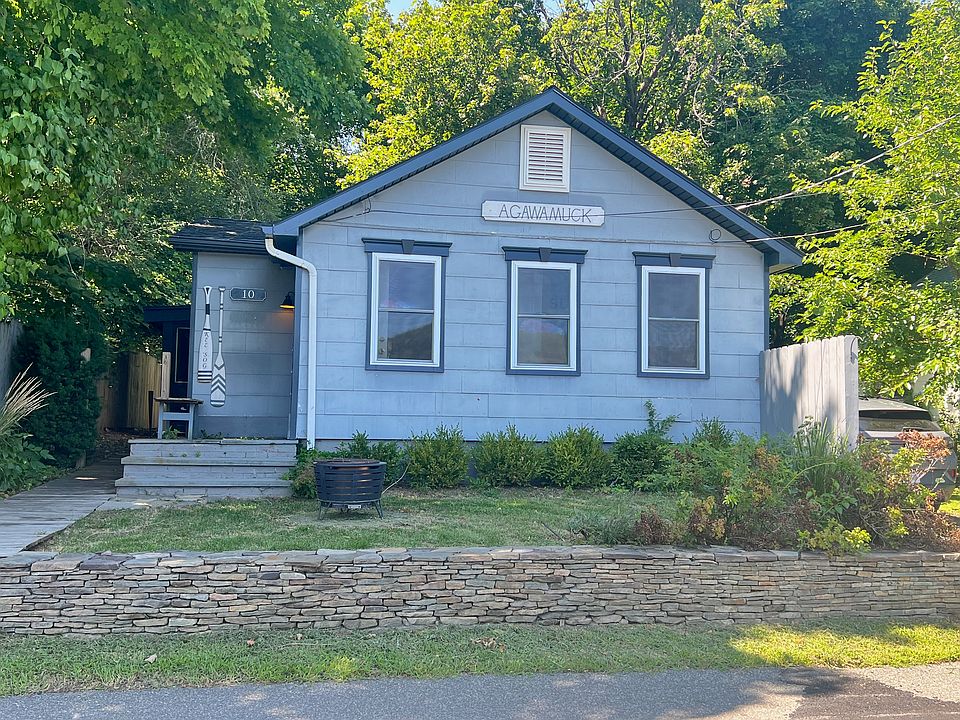 Front Exterior with Garden and Fire Pit