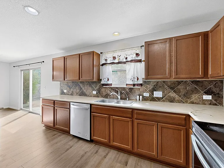 6609 Garden Rose Path — Photo 11
