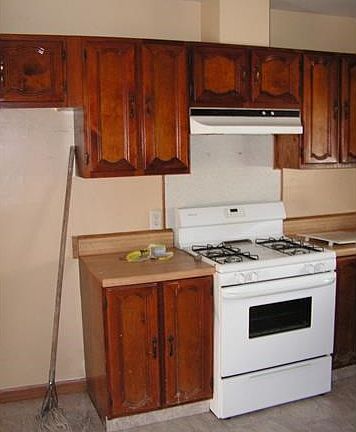 Kitchen with gas stove.