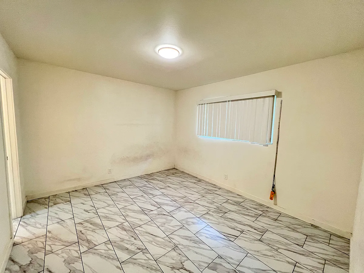 Building Photo - 8715 S Central Ave #2