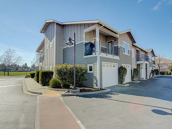 Back of the apartment with garage door.