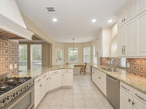 Look at these updates!: Typhoon Bordeaux granite countertops from Brazil, 36" Verona stainless dual fuel 5 burner gas range/electric oven, Zephyr Monsoon hood, Vigo double bowl stainless sink, EdgeStar 18-bottle wine fridge, 24" Frigidaire Gallery dishwasher.