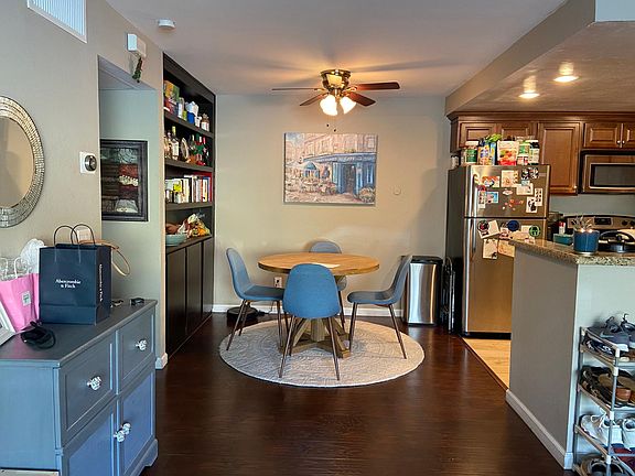dining area with built in bookshelf
