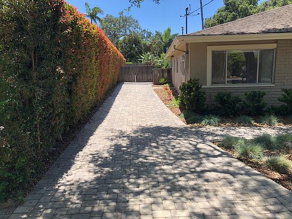 Paver drivewaywith lockable privacy gate