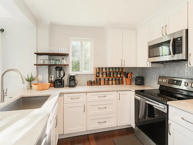 This bright, updated kitchen is everything you need for cooking and dining in style.