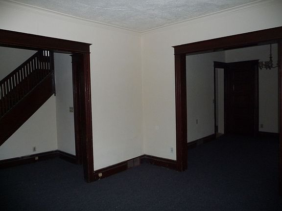 Living Room with entrances to foyer & dining room